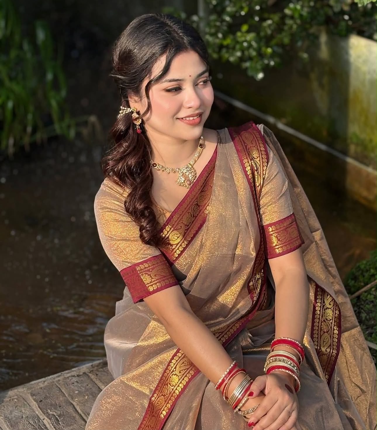 ✨ Luxury Golden Saree ✨ Elegant and stylish saree with beautiful golden texture and maroon border design. Perfect for w